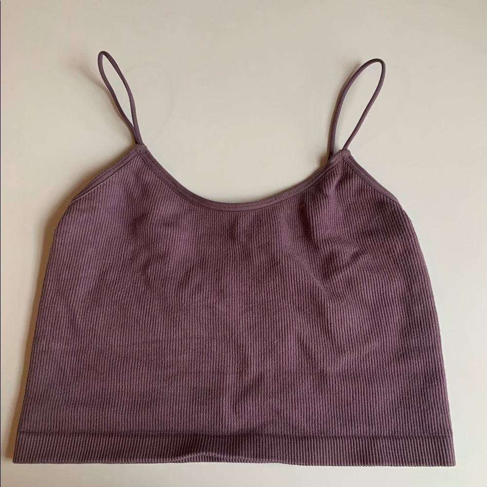 This is a tight tank top. It’s super trendy I just don’t fit in it anymore!